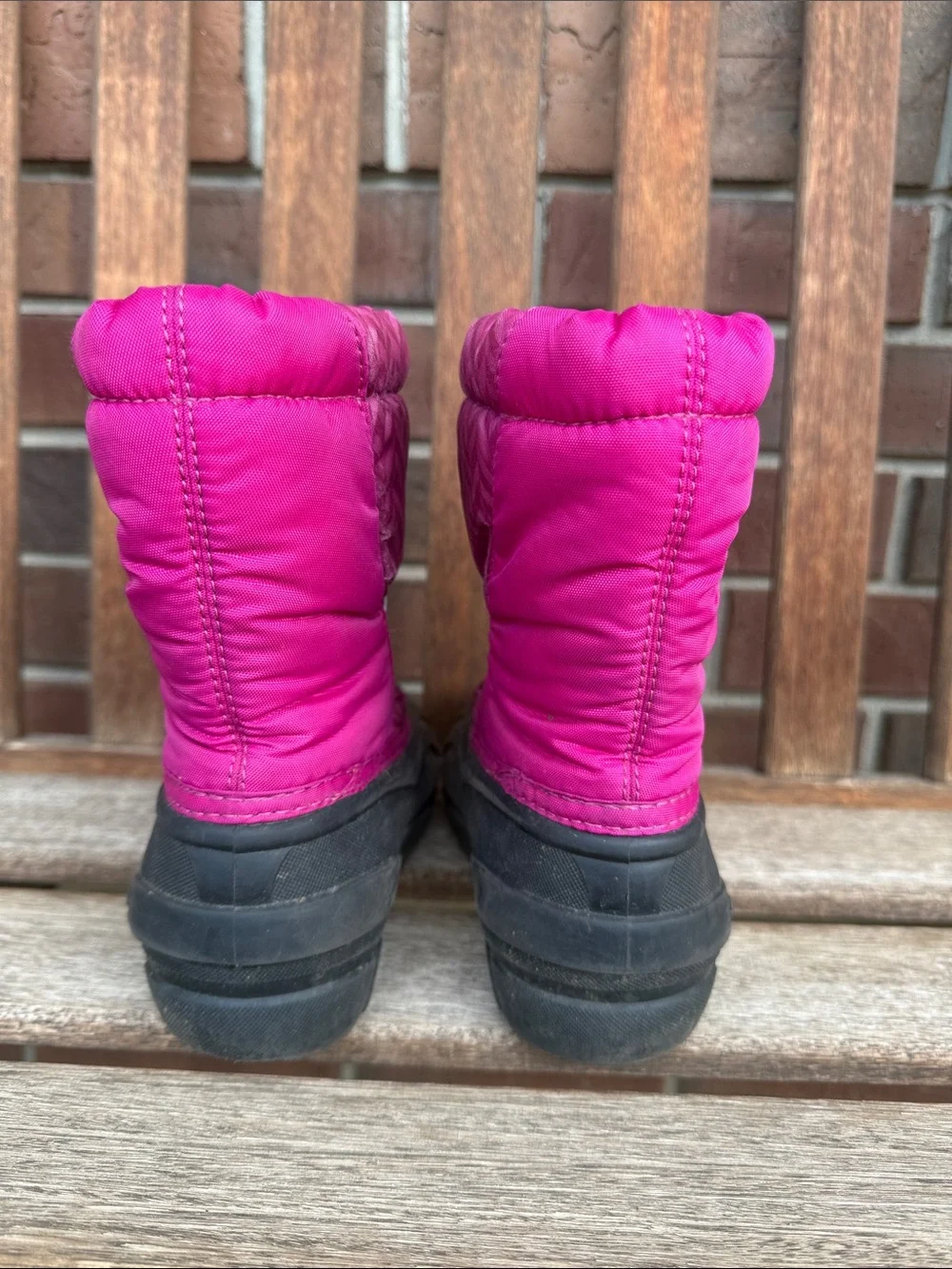 Sorel Kids' Magenta Pink Snow Boots with Black Soles